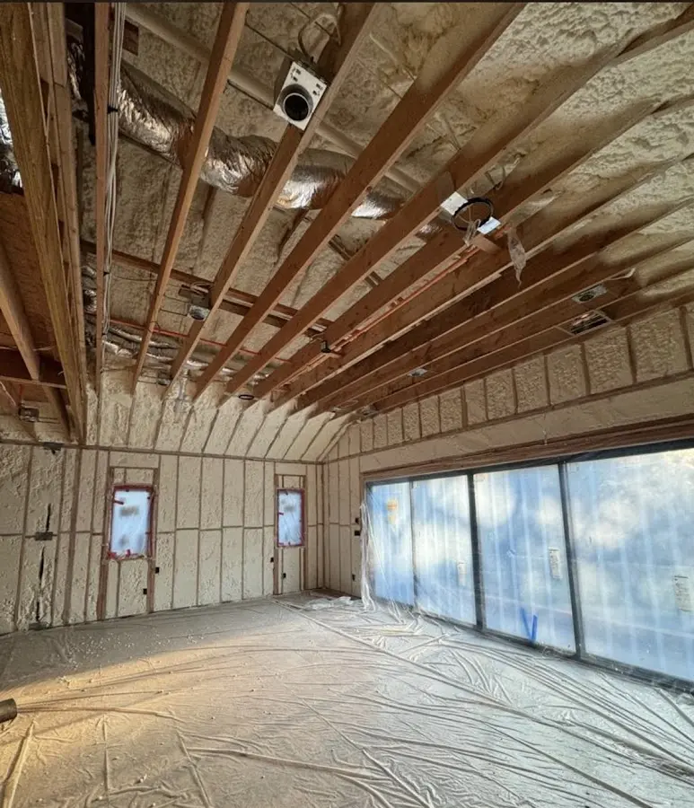 Interior walls and ceiling insulated with spray foam during new construction in Belen